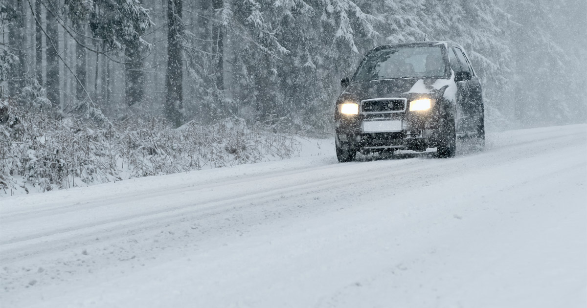 SUV driving in the snow