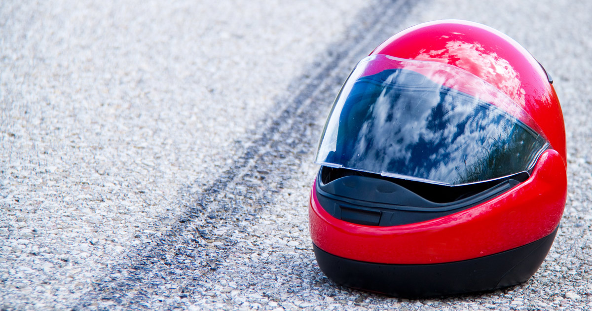 Helmet on road after a motorcycle accident