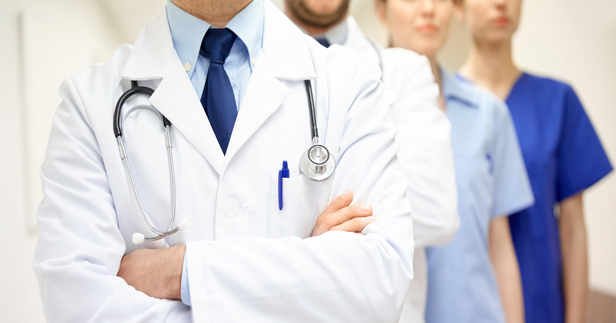 nurses and doctors standing